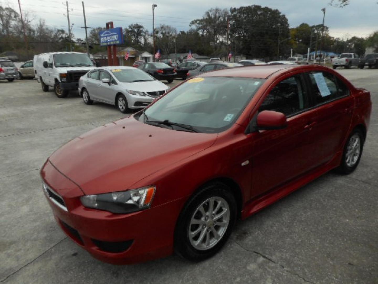 2014 RED MITSUBISHI LANCER (JA32U2FU2EU) , located at 390 Hansen Avenue, Orange Park, FL, 32065, (904) 276-7933, 30.130497, -81.787529 - Photo#1